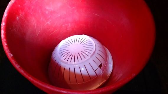 Test fitting colander in the Global Bucket